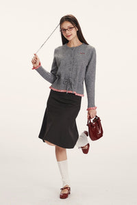 Strickjacke mit Raffung und Strickstruktur