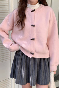 Locker geschnittene Strickjacke mit Knopfdetails und Strickstruktur in Gelb