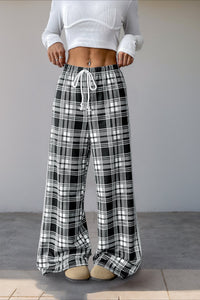 Locker geschnittene Hose mit Karomuster