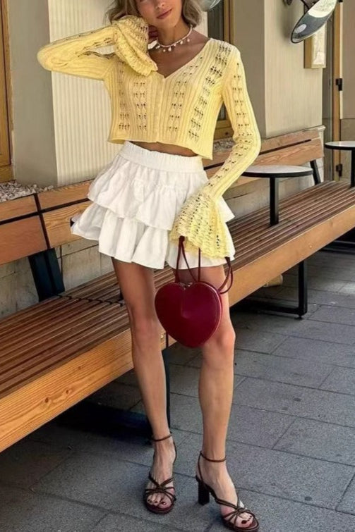 Strickjacke mit V-Ausschnitt, Aussparungen und Strickstruktur
