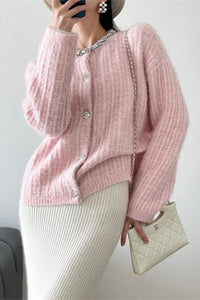 Strickjacke mit V-Ausschnitt und Strickstruktur in Weiß