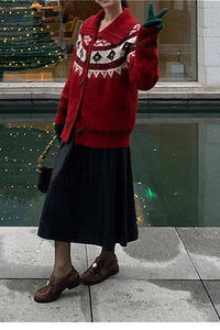 Locker geschnittene Strickjacke mit Knopfdetails und Strickstruktur
