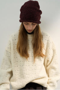 Locker geschnittener Pullover mit Rundhalsausschnitt, Strickstruktur und Wolle
