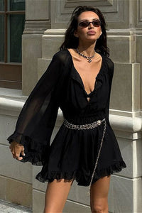 Minikleid mit Raffung und Netzdetails in Schwarz