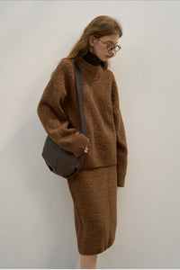 Locker geschnittener Pullover mit Rundhalsausschnitt, Strickstruktur und Wolle