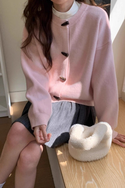 Locker geschnittene Strickjacke mit Knopfdetails und Strickstruktur in Gelb