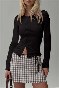 Figurbetonter Pullover mit Rundhalsausschnitt und Strickstruktur