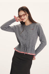 Strickjacke mit Raffung und Strickstruktur