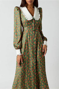 Kleid mit Raffung und Blumenmuster