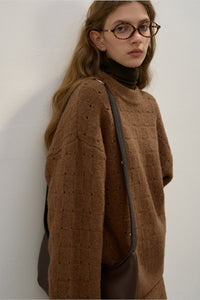 Locker geschnittener Pullover mit Rundhalsausschnitt, Strickstruktur und Wolle