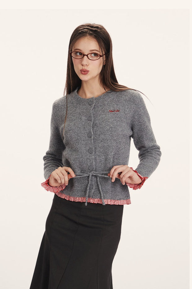 Strickjacke mit Raffung und Strickstruktur