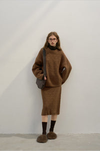 Locker geschnittener Pullover mit Rundhalsausschnitt, Strickstruktur und Wolle