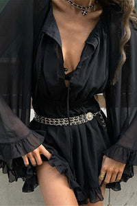 Minikleid mit Raffung und Netzdetails in Schwarz