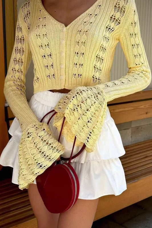Strickjacke mit V-Ausschnitt, Aussparungen und Strickstruktur
