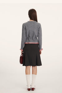 Strickjacke mit Raffung und Strickstruktur