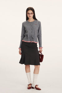 Strickjacke mit Raffung und Strickstruktur