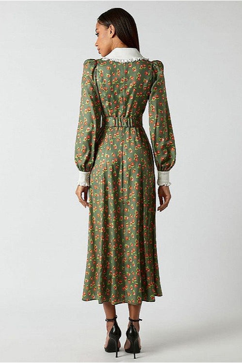 Kleid mit Raffung und Blumenmuster