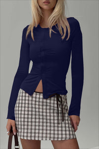 Figurbetonter Pullover mit Rundhalsausschnitt und Strickstruktur