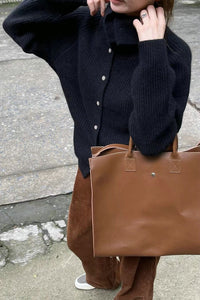 Locker geschnittene Strickjacke mit Knopfdetails und Strickstruktur in Cremeweiß