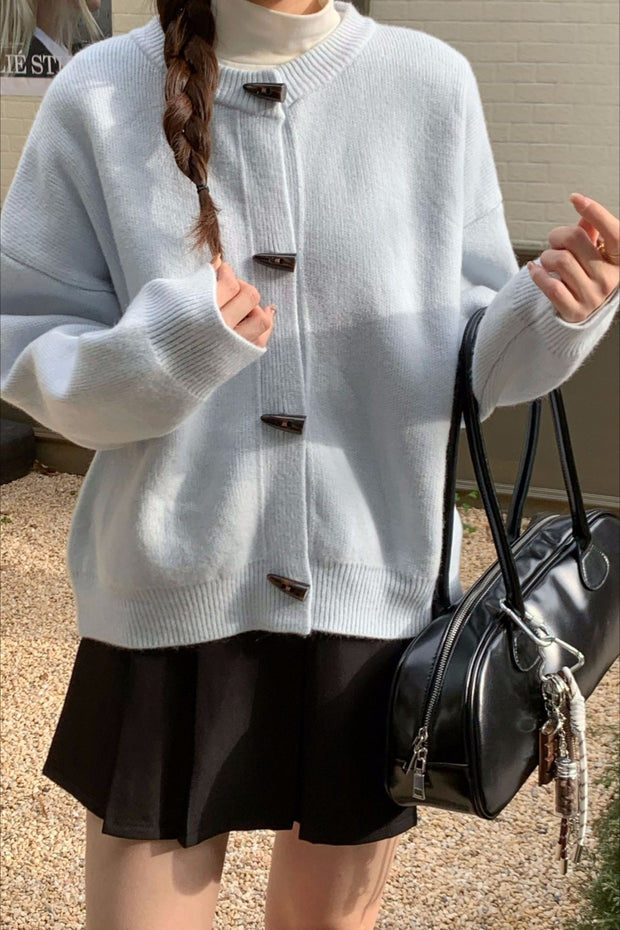 Locker geschnittene Strickjacke mit Knopfdetails und Strickstruktur in Gelb